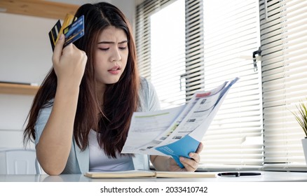 Young Woman Stressed Over Credit Card Debt Collection Documents. Financial Problem Concept.