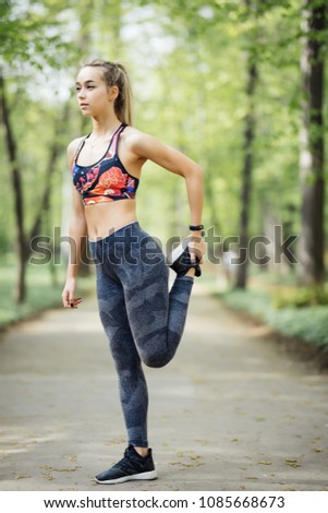 Similar – Slim figure shapely woman in sportswear