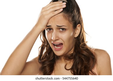 young woman with a strong headache
