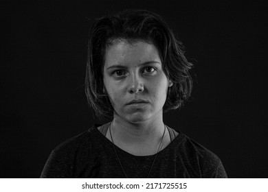 Young woman in studio black and white photo - Powered by Shutterstock