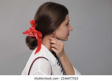 Young Woman With Stylish Bandana On Grey Background