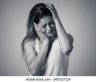 Young Woman Suffering From Depression Feeling Miserable Hopeless And Suicidal. Portrait Of Depressed Teen Female Crying In Distress. Facial Expressions Human Emotions And Mental Health Concept.