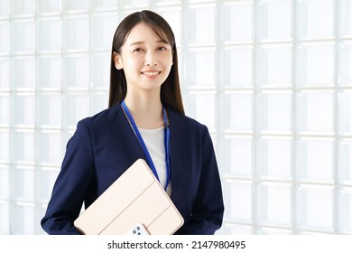 Young Woman In A Suit