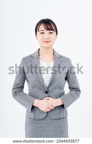  A young woman in suit                             