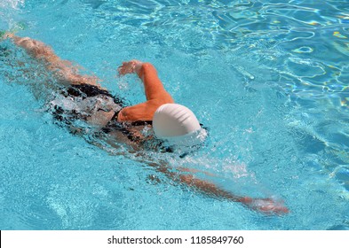 Young Woman Swimming Freestyle Laps Stock Photo (Edit Now) 1185849760