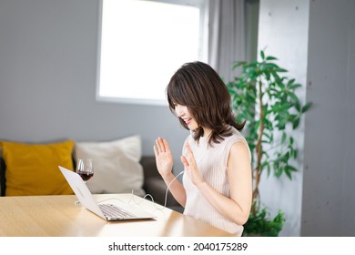 A Young Woman Taking An Online English Conversation Class