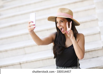 Young Woman Taking Selfie Outdoor