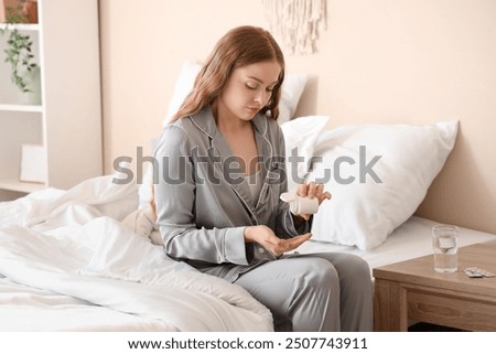 Similar – Image, Stock Photo A young woman takes a break from her creative work