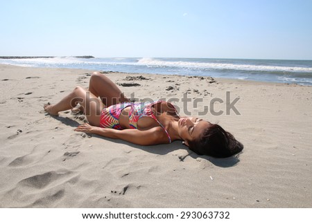 young woman taking a sunbath 