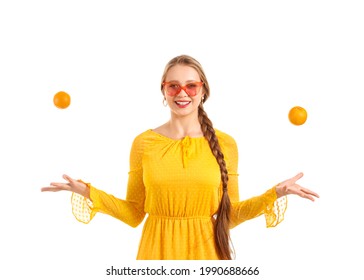 Young woman with tangerines on white background. Diet concept