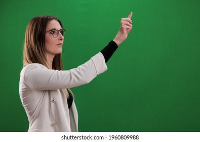 Young Woman Taps On A Large Imaginary Touchscreen - Studio Photography