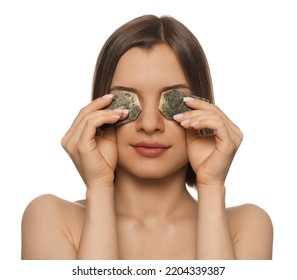 Young Woman With Tea Bags On White Background. Eye Skin Care