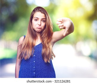 Young Woman With Thumb Down