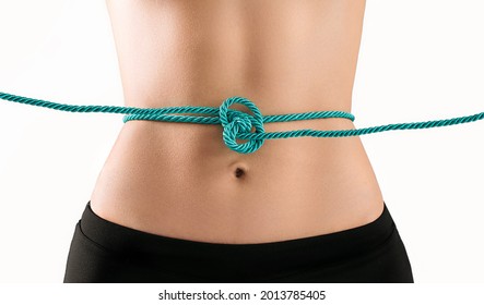 Young Woman Tied With A Cord On Her Belly