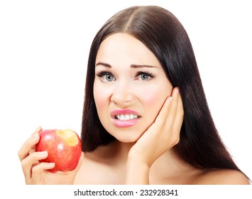 Young woman with a toothpain, white background, copyspace 