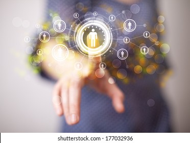 Young woman touching future technology social network button 