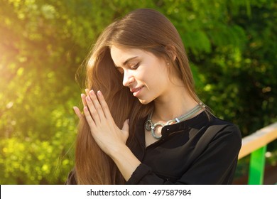 Young Woman Touching Her Hair