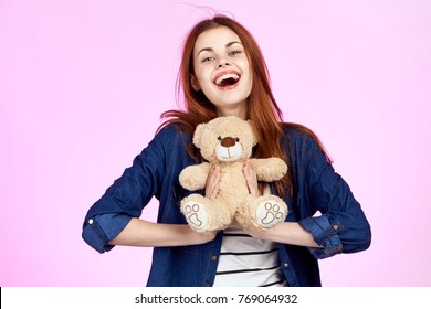  young woman with toy bears                              