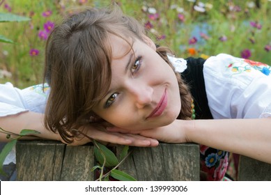 Young Woman In Traditional Polish Costume, A Polish Folk Costume.