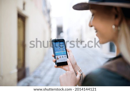 Similar – Image, Stock Photo unrecognizable woman traveling by car with her cute small dog