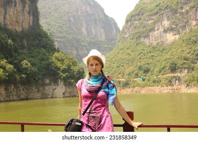 Young Woman Traveler At The Tourist Cruise Boat At Three Gorges On Yangtze River, China