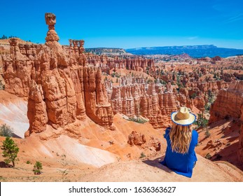 Young Woman Travels Bryce Canyon National Park In Utah, United States, People Travel Explore Nature. Bryce Is A Collection Of Giant Natural Amphitheaters Distinctive Due Hoodoos Geological Structures