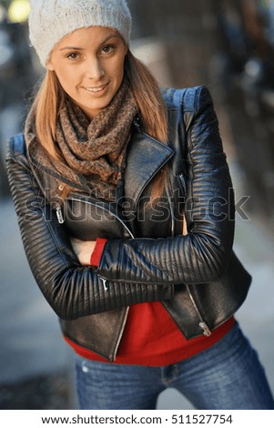 Similar – Image, Stock Photo Blonde girl wearing white sweater smiling in the street