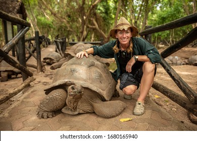 Young Woman With A Turtle, Zanzibar, Tanzania, Africa