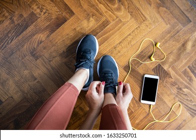 Young Woman Tying Shoelace Before Workout, Getting Ready For Jogging.