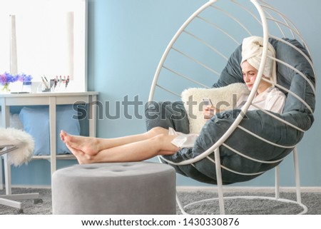 Similar – Mother hugging her baby in front of fireplace