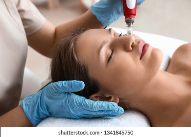 Young Woman Undergoing Procedure Of Bb Glow Treatment In Beauty Salon