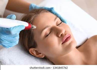 Young woman undergoing procedure of bb glow treatment in beauty salon - Shutterstock ID 1341845762