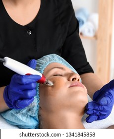 Young Woman Undergoing Procedure Of Bb Glow Treatment In Beauty Salon