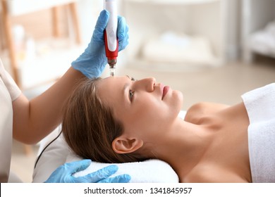 Young Woman Undergoing Procedure Of Bb Glow Treatment In Beauty Salon