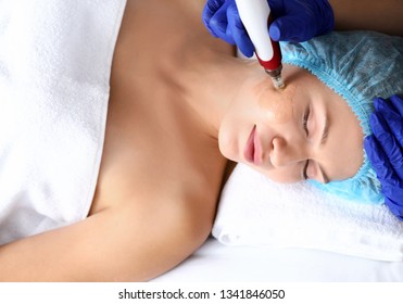 Young Woman Undergoing Procedure Of Bb Glow Treatment In Beauty Salon