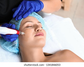 Young Woman Undergoing Procedure Of Bb Glow Treatment In Beauty Salon