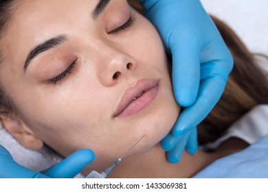 Young Woman Undergoing Procedure Of Bb Glow Treatment In Beauty Salon