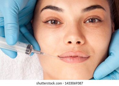 Young Woman Undergoing Procedure Of Bb Glow Treatment In Beauty Salon