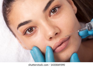 Young Woman Undergoing Procedure Of Bb Glow Treatment In Beauty Salon