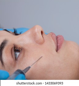 Young Woman Undergoing Procedure Of Bb Glow Treatment In Beauty Salon