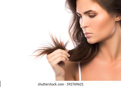 Young Woman Is Unhappy With Split Ends Of Her Hair