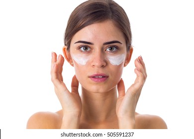 Young Woman Using Cream