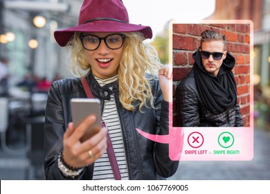 Young woman using dating app on mobile phone - Shutterstock ID 1067769005
