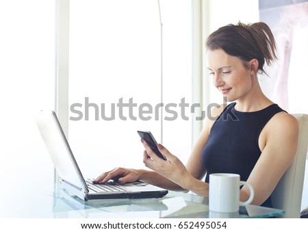 Young woman using devices