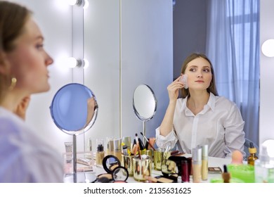 Young Woman Using Gua Sha Massage Scraper