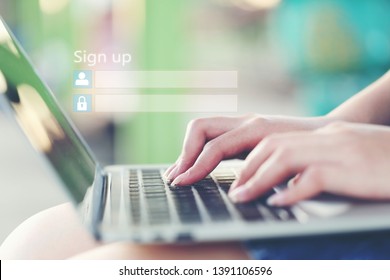 Young Woman Using Laptop Computer And Sign Up Or Log In Username Password In Coffee Shop,GDPR.cyber Security And Privacy Concept