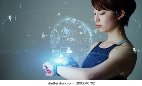 Young Woman Using A Smart Watch. Wearable Computer. Health Care Technology. Sports Tech.