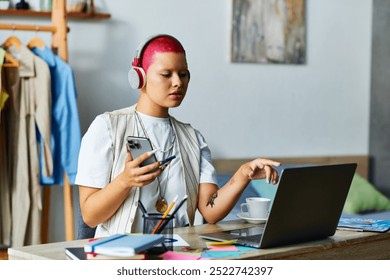 A young woman with vibrant pink hair engages with her laptop while multitasking at home. - Powered by Shutterstock