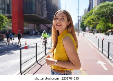Young woman visiting Paulista Avenue in Sao Paulo, Brazil