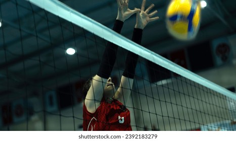 young woman volleyball player at match - Powered by Shutterstock